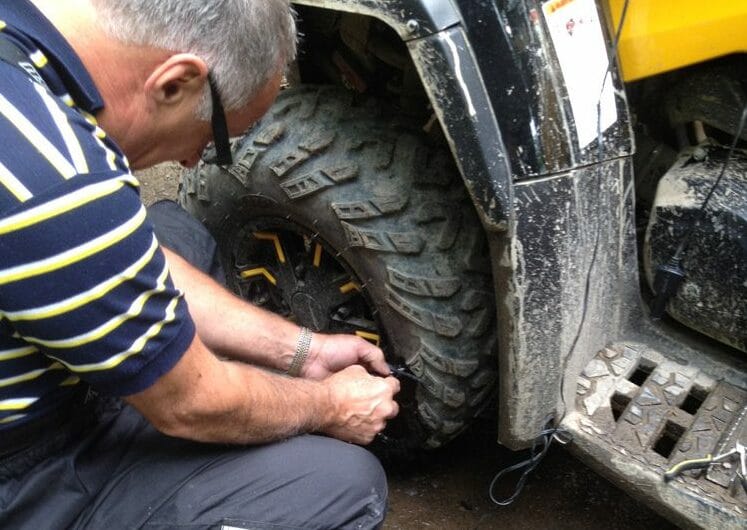 Repairing a flat tire while on the trail