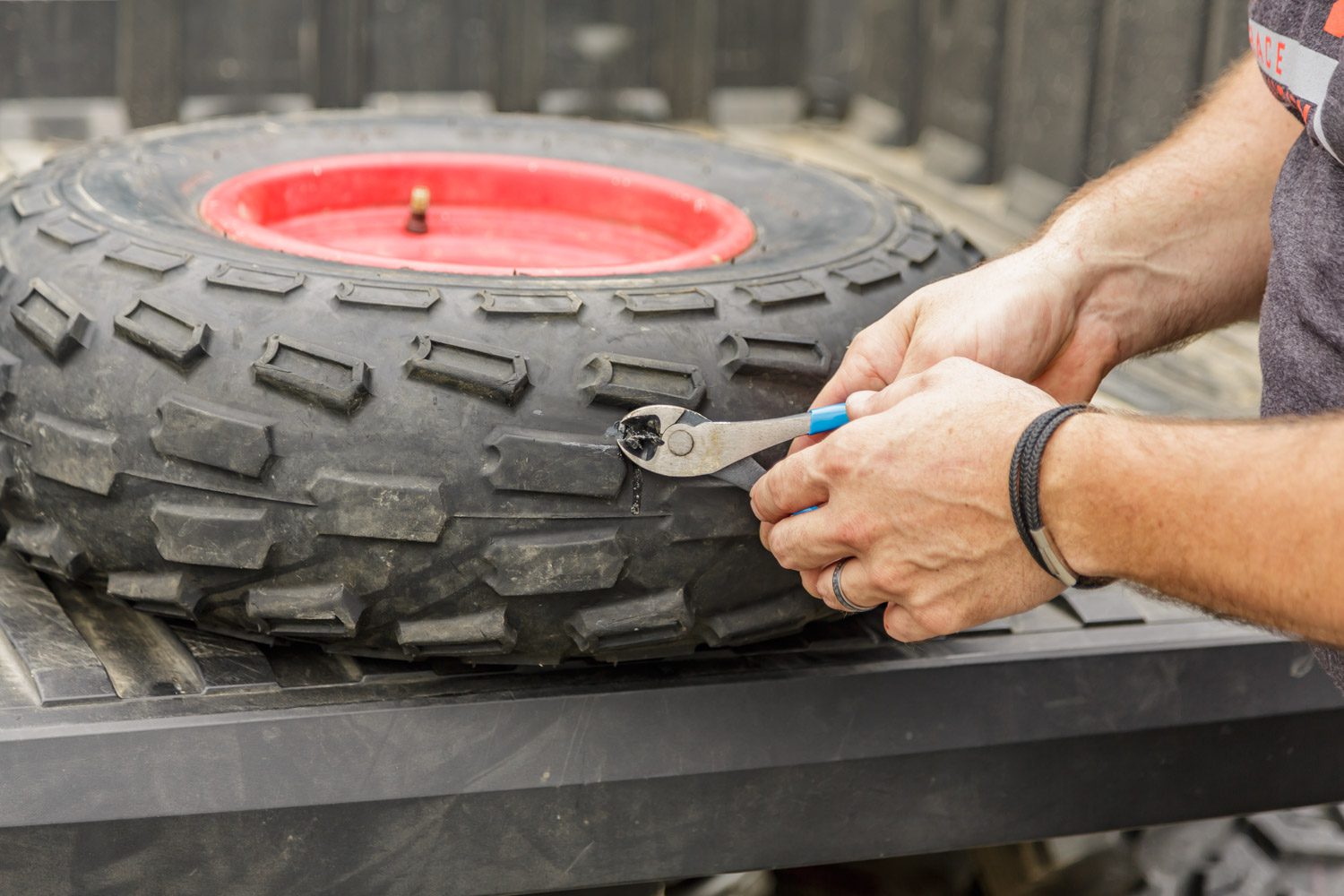 Repairing a flat tire while on the trail