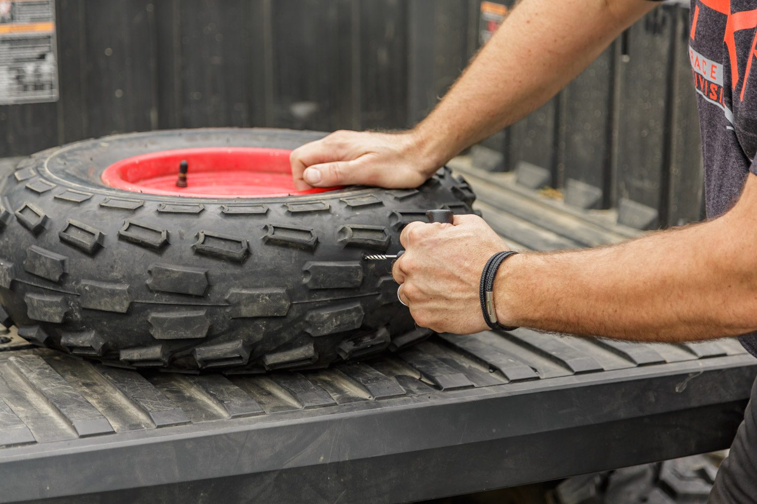 Repairing a flat tire while on the trail